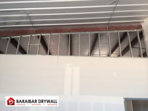 Drywall installation in shop